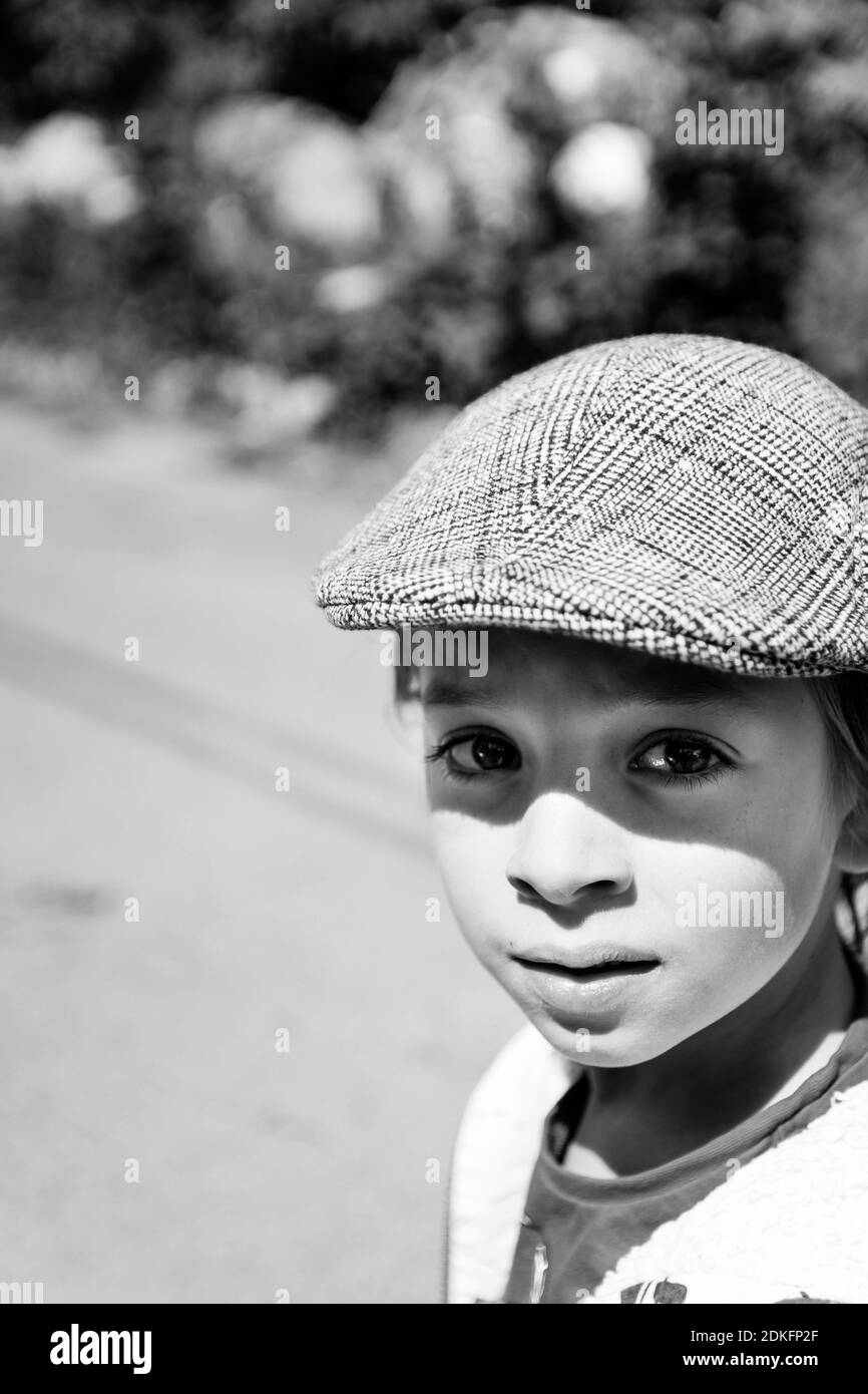 Boy wearing cap Black and White Stock Photos & Images - Alamy
