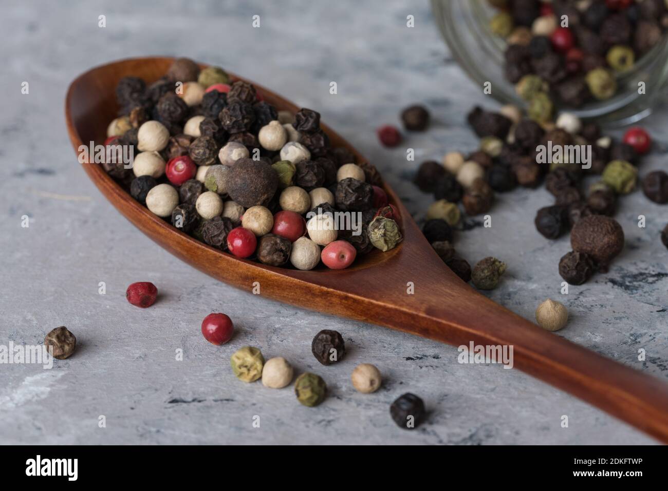Close-up Of Peppercorns In Spoon On Table Stock Photo