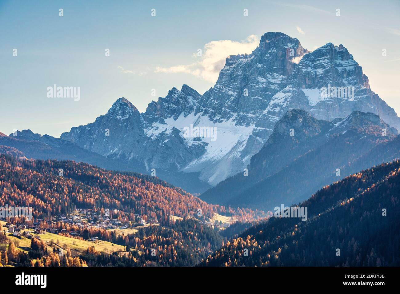 mountain Pelmo and some houses of Santa Fosca village, Fiorentina valley, Dolomites, Belluno, Veneto, Italy Stock Photo