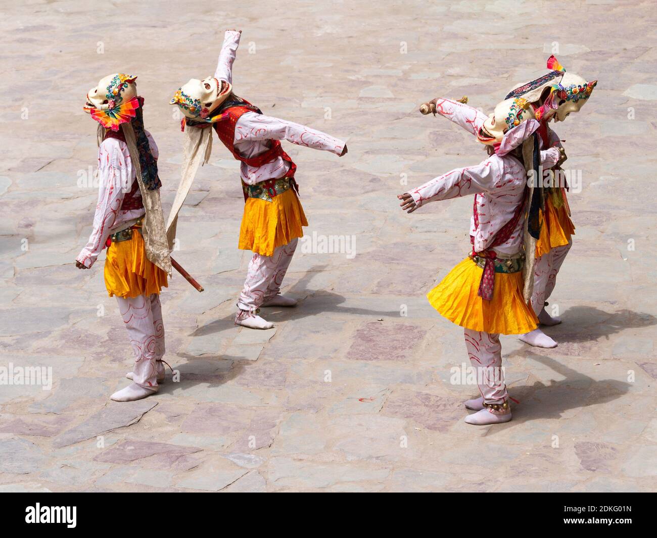 Unidentified monks in Citipati masks performs a religious costumed mystery dance of Tantric Tibetan Buddhism during the Cham Dance Festival in Hemis m Stock Photo