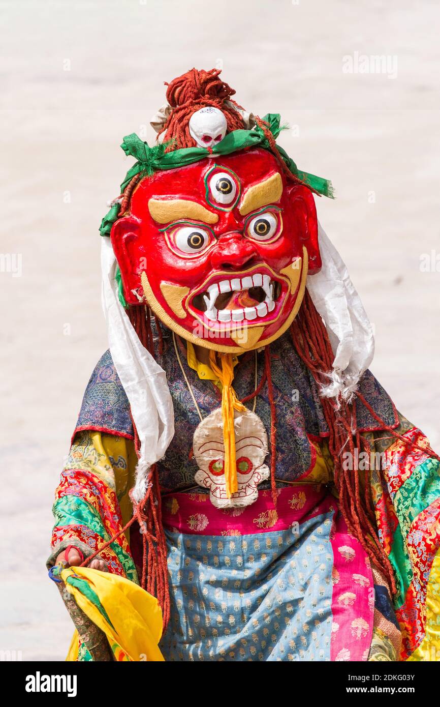 Unidentified monk performs a religious masked and costumed mystery dance of Tibetan Buddhism during the Cham Dance Festival in Hemis monastery in Hima Stock Photo