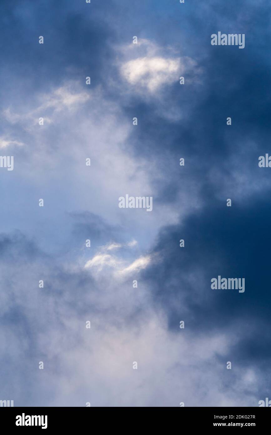 Cloudy sky in romantic blue and white before thunderstorm Stock Photo