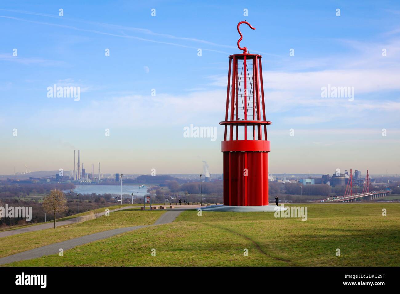 Moers, Ruhr area, North Rhine-Westphalia, Germany - Das Geluchte, work of art by Otto Piene on the Rheinpreussen heap, 30 m high sculpture in the form of a miner's lamp, behind the Rhine and ThyssenKrupp industrial plants in Duisburg. Stock Photo