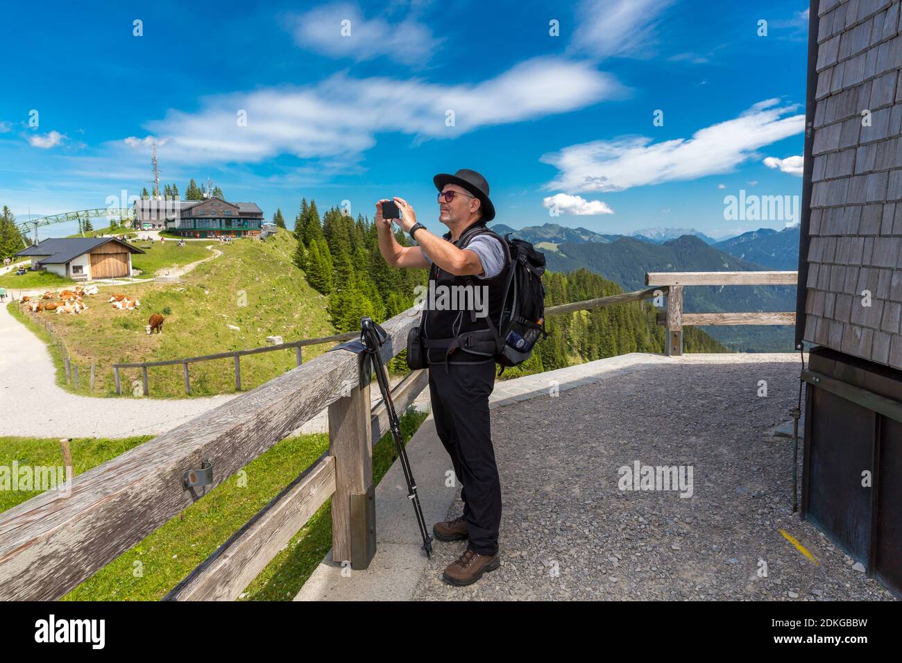 Man taking photos with the smartphone, Wallberg, Rottach-Egern, Tegernsee, Bavarian Alps, Bavaria, Germany, Europe Stock Photo