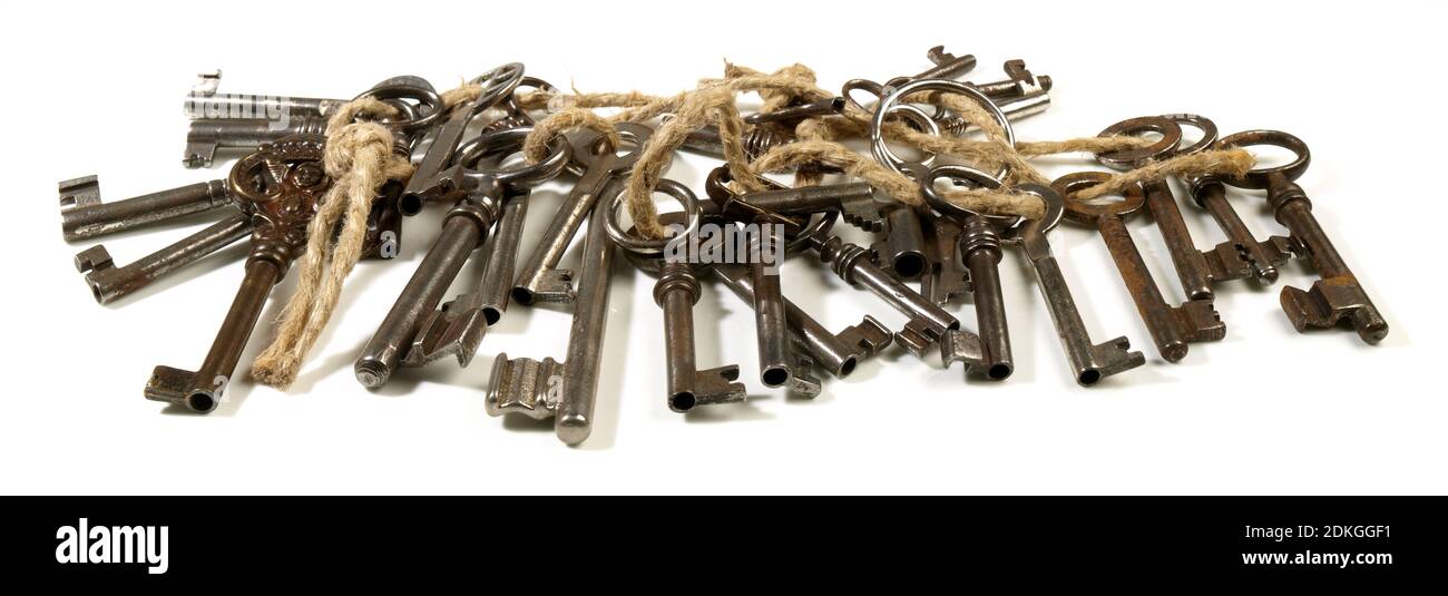 Old Keys on Cord Panorama isolated on white Background Stock Photo