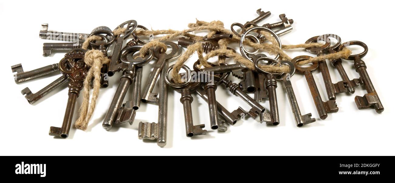 Old Keys on Cord Panorama isolated on white Background Stock Photo
