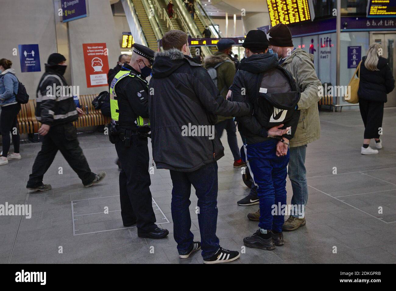 London (UK), 15 December 2020 British Transport police handcuff and