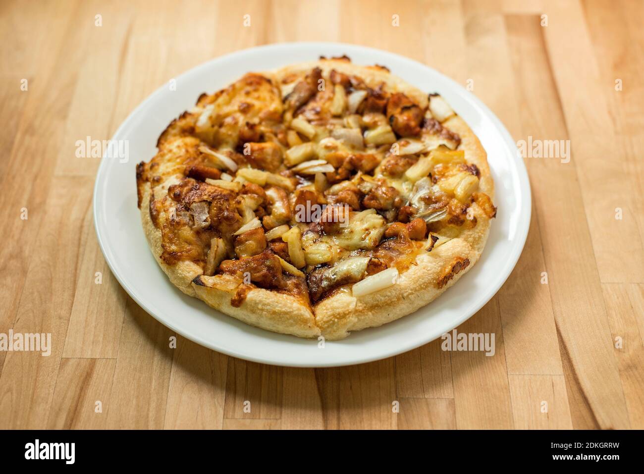 Close-up Of Pizza Served In Plate On Table Stock Photo