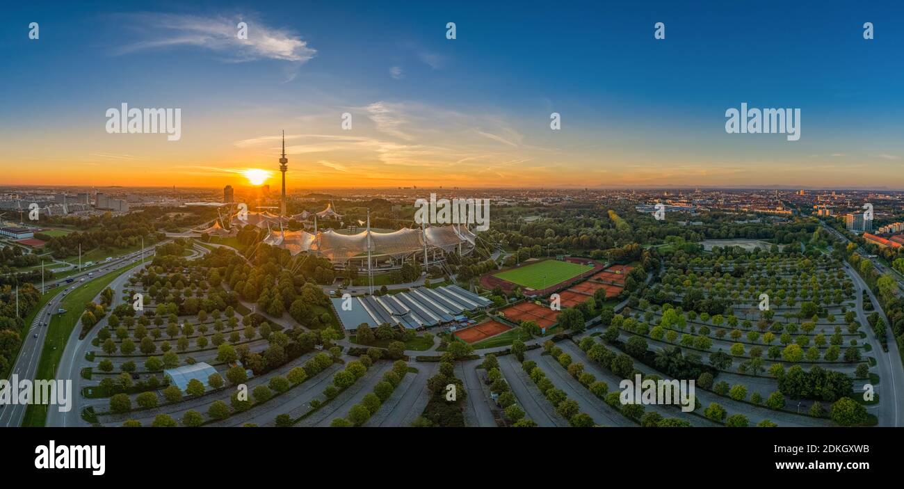 Munich from above at a orange sunrise, shot by a drone. Stock Photo