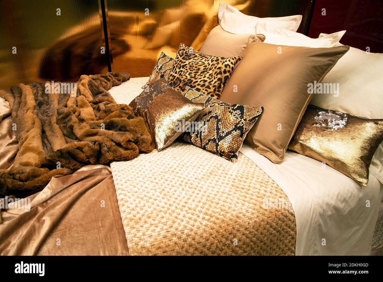 Decorative pillows on a bed Stock Photo Alamy