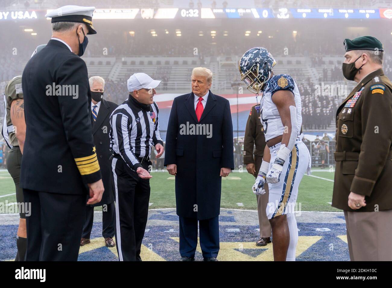 U.S. President Donald Trump takes part in the coin toss at the start the 121st Army-Navy football game at Michie Stadium December 12, 2019 in West Point, New York. The Army Black Knights shutout the Navy Midshipmen 15-0. Stock Photo