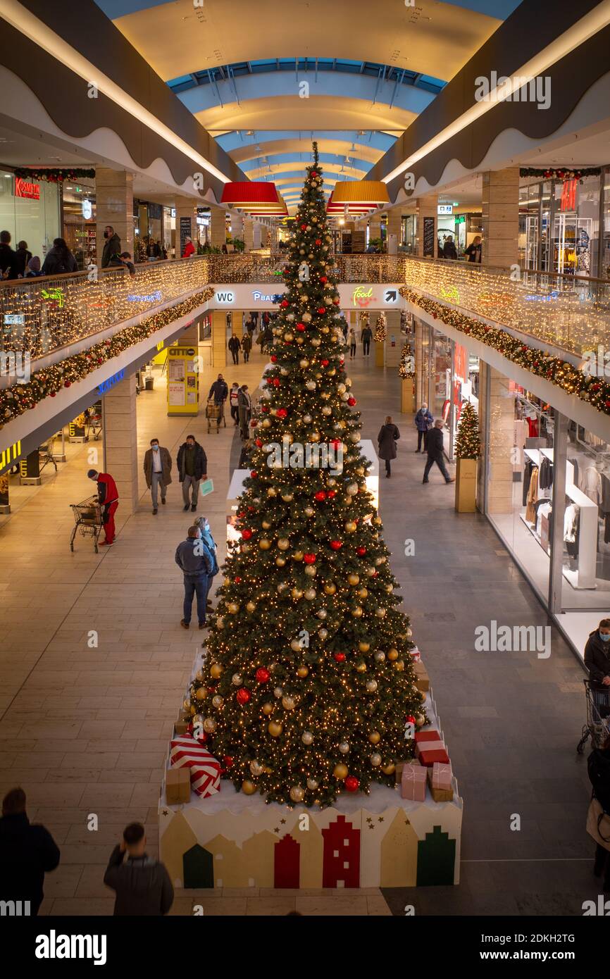 a shopping center decorated for Christmas with colorful lights Stock ...