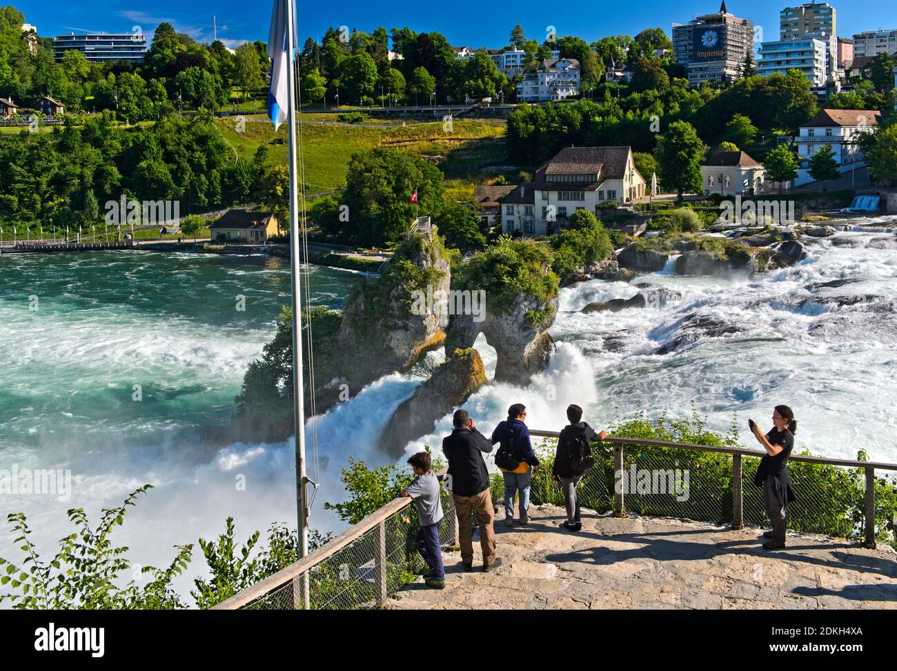Tourists on a viewing platform at the Rhine Falls, Laufen-Uhwiesen near Schaffhausen, Switzerland Stock Photo