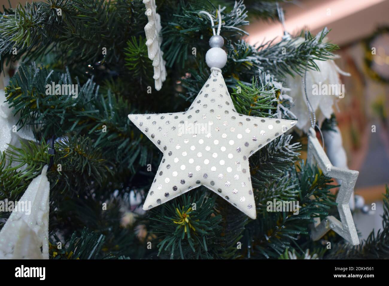 Christmas tree with decorations, balls, stars and garlands. Christmas background Stock Photo