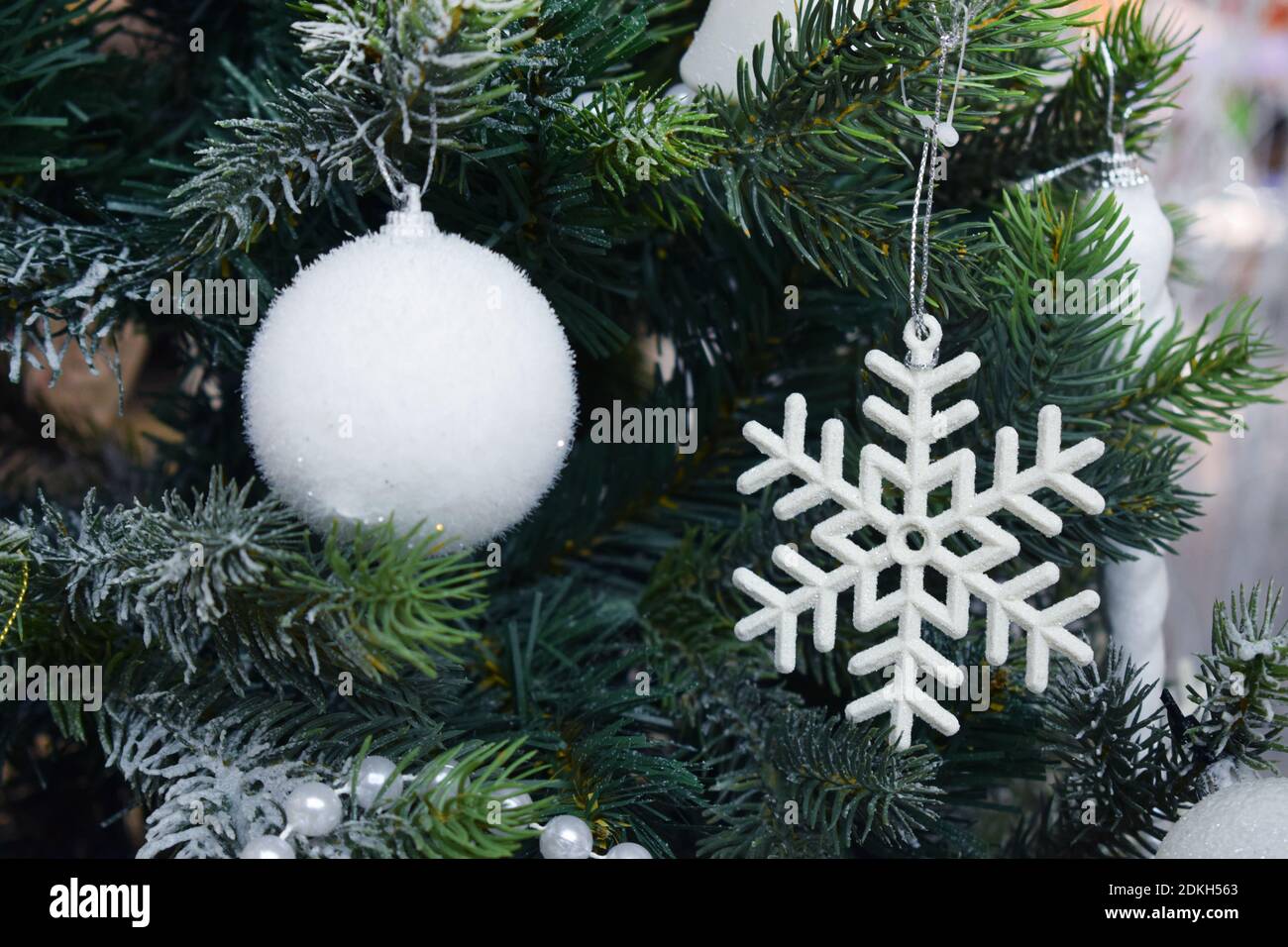 Christmas tree with decorations, balls, stars and garlands. Christmas background Stock Photo