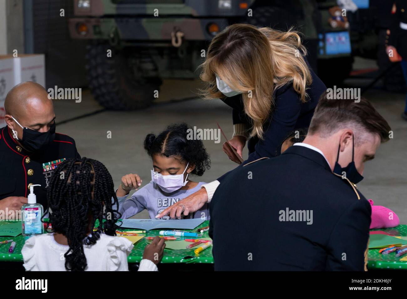 U.S. First Lady Melania Trump works with children to write Christmas cards to the troops during a Toys for Tots Christmas event at Joint Base Anacostia-Bolling December 8, 2020 in Washington, D.C. Stock Photo