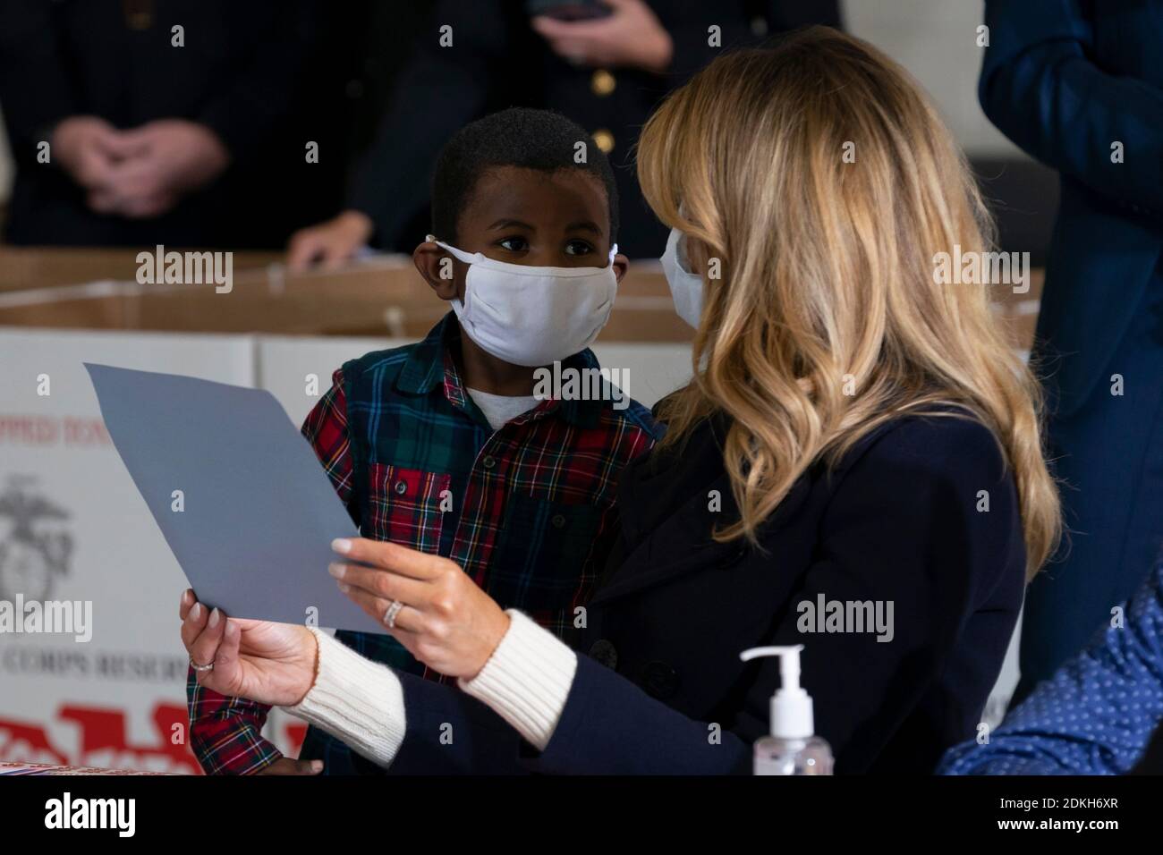 U.S. First Lady Melania Trump works with children to write Christmas