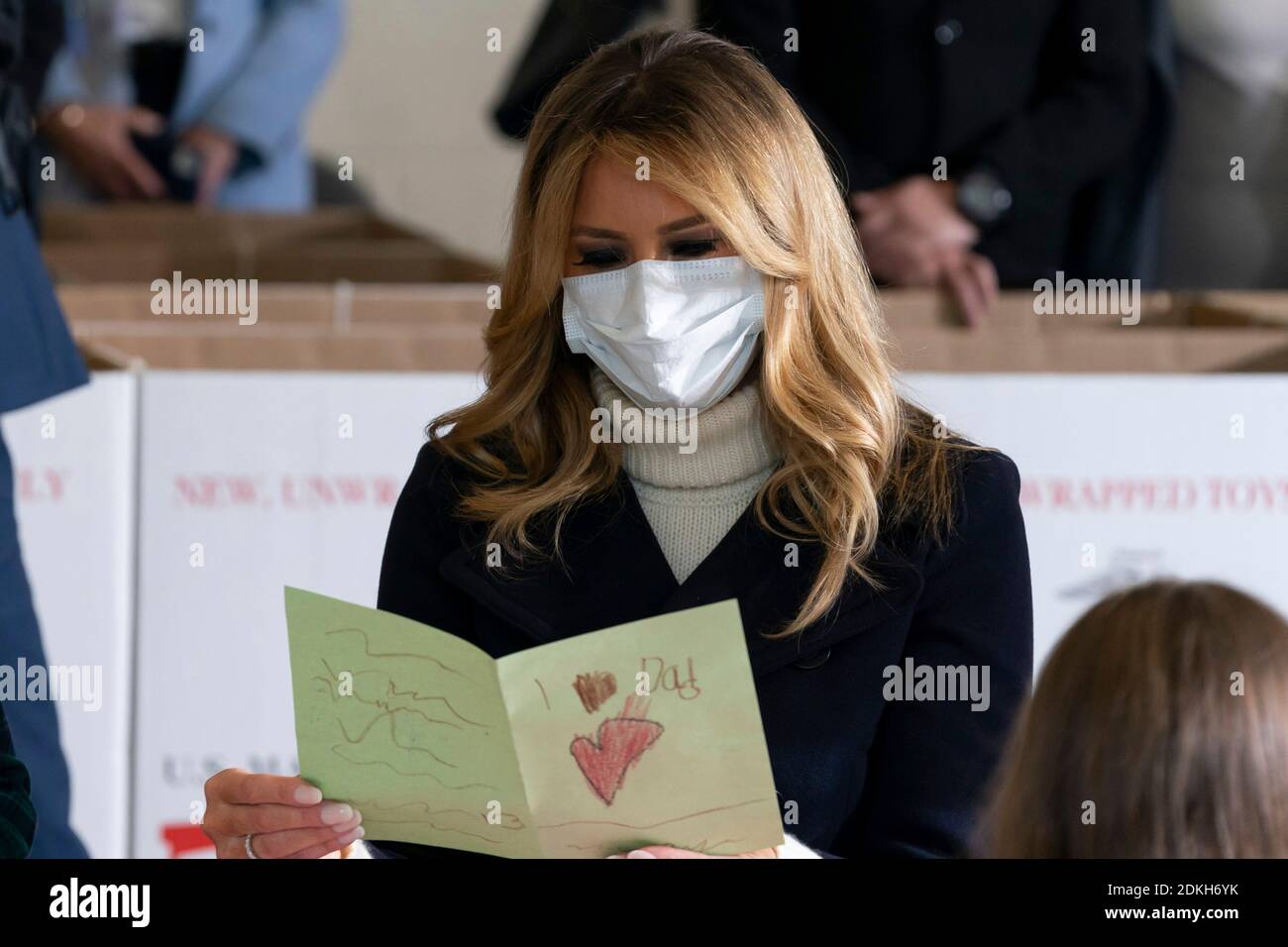 U.S. First Lady Melania Trump works with children to write Christmas cards to the troops during a Toys for Tots Christmas event at Joint Base Anacostia-Bolling December 8, 2020 in Washington, D.C. Stock Photo