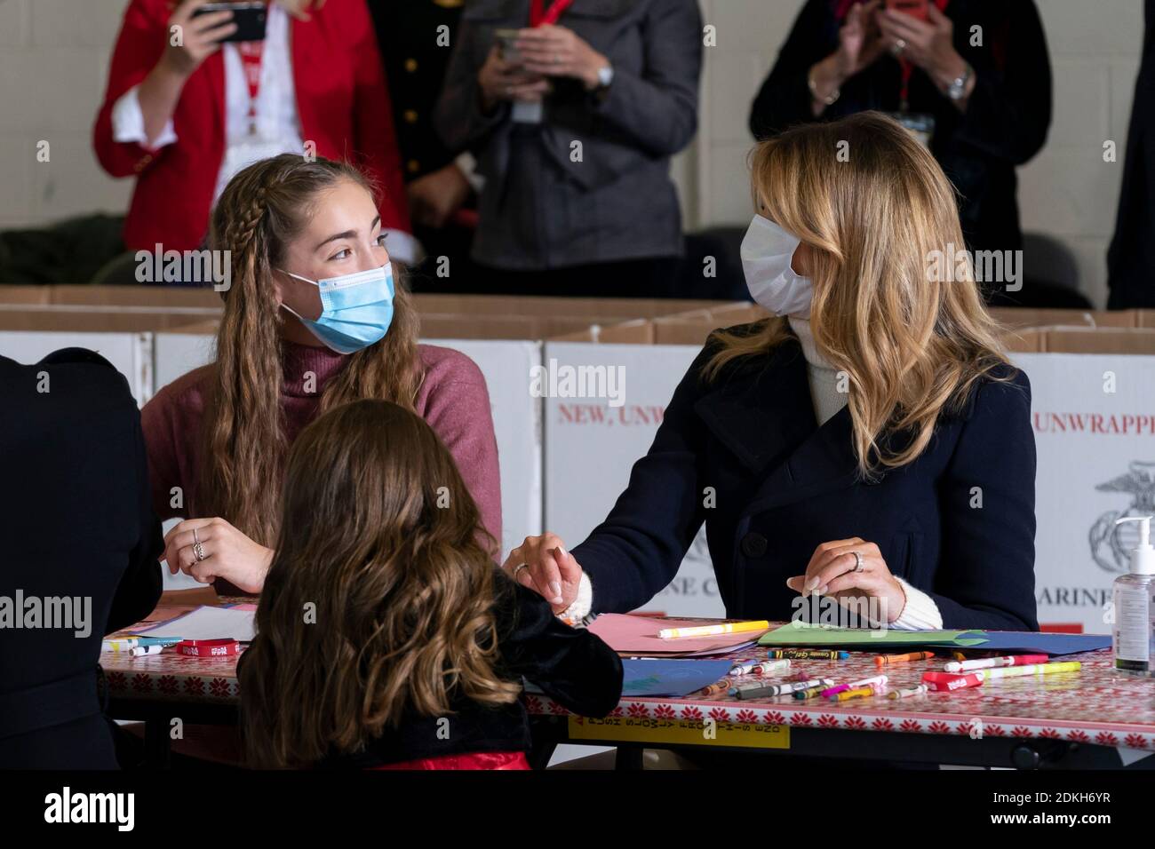 U.S. First Lady Melania Trump works with children to write Christmas cards to the troops during a Toys for Tots Christmas event at Joint Base Anacostia-Bolling December 8, 2020 in Washington, D.C. Stock Photo