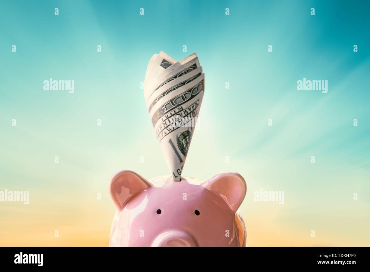 Close-up Of Piggy Bank On Blue Background Stock Photo