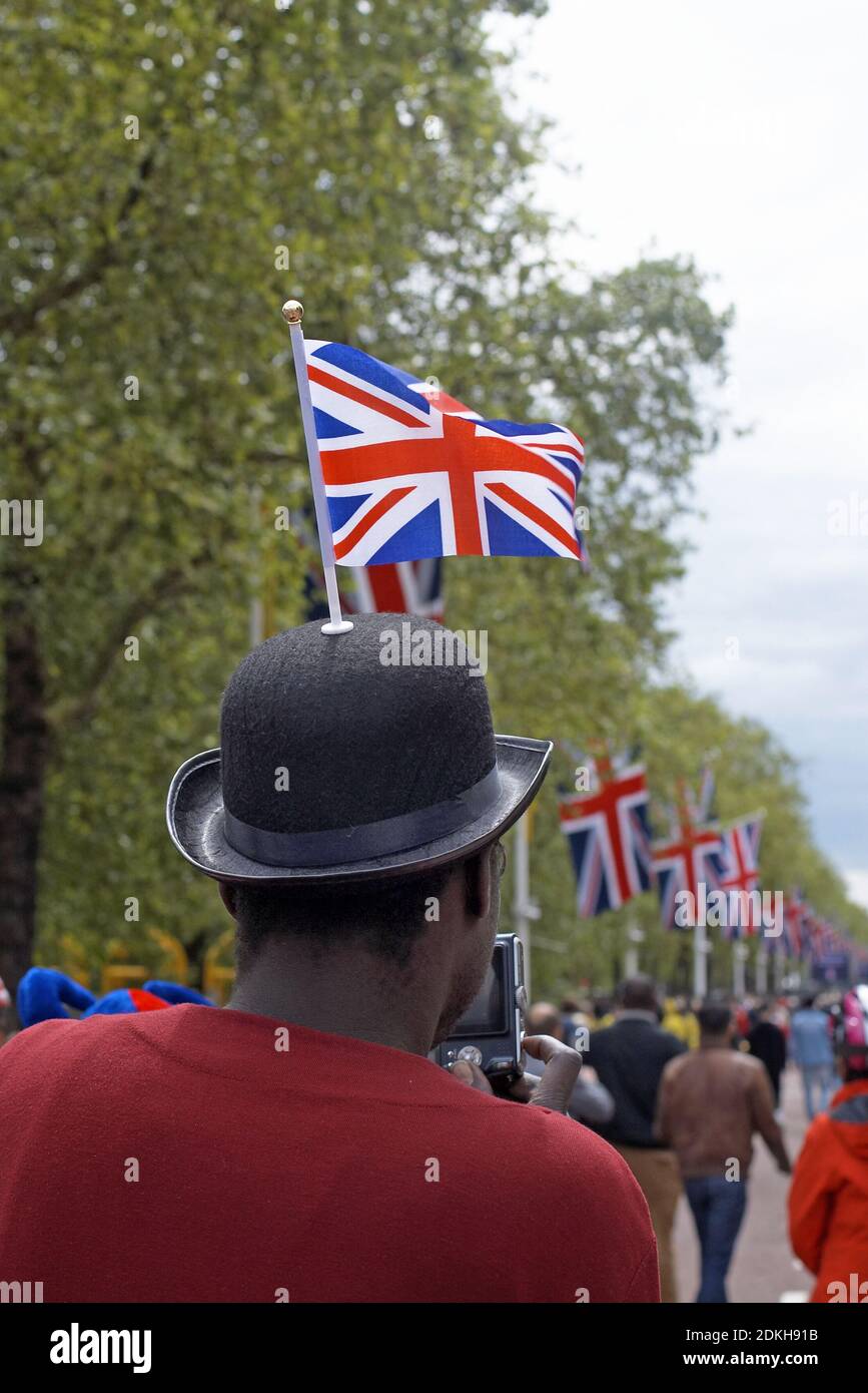 England / London /A man with bowler hat union jack flag on the Mall during the Diamond Jubilee Buckingham Palace Concert on June 4, 2012 . Stock Photo