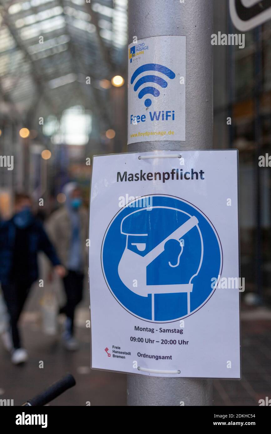 Sign use face mask, mask compulsory in a shopping arcade, Bremen
