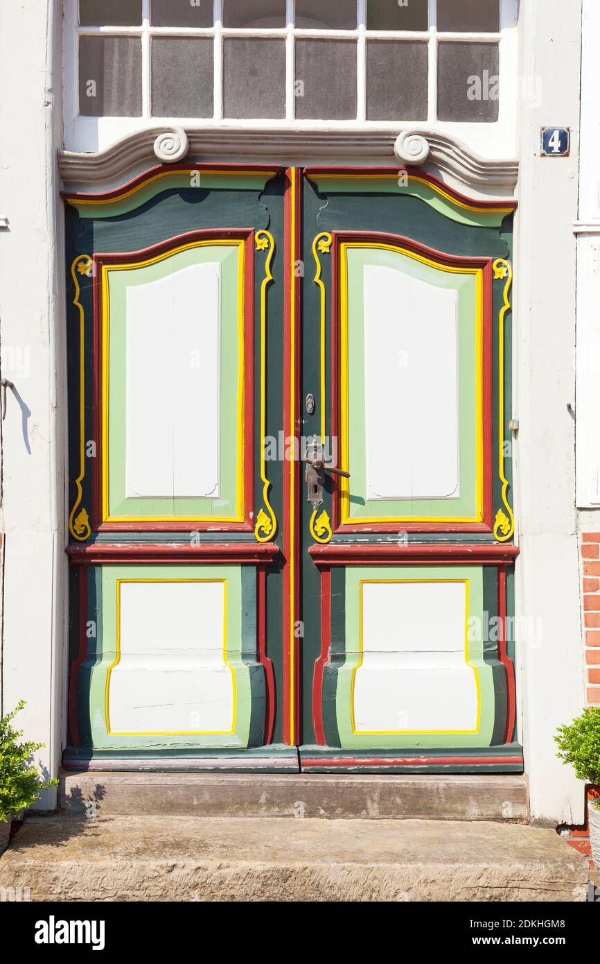 Old ornate door on a half-timbered house, Nordseeheilbad Otterndorf, Lower Saxony, Germany Stock Photo