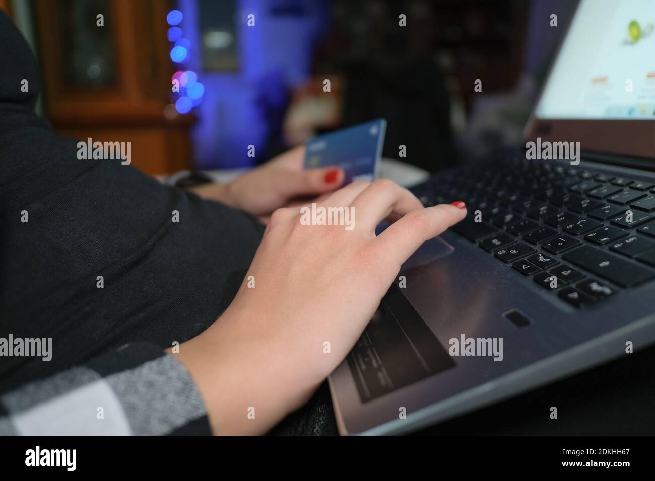 Woman use credit card for web payment on laptop,tech e-commerce business Stock Photo