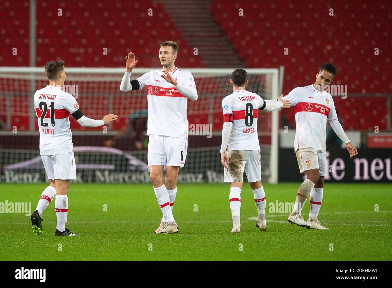 Stuttgart, Germany. 15th Dec, 2020. Football: Bundesliga, VfB Stuttgart - 1. FC Union Berlin, Matchday 12, Mercedes-Benz Arena. Stuttgart's Philipp Klement (l-r), Sasa Kalajdzic, Gonzalo Castro and Daniel Didavi rejoice after the match. Credit: Sebastian Gollnow/dpa - IMPORTANT NOTE: In accordance with the regulations of the DFL Deutsche Fußball Liga and/or the DFB Deutscher Fußball-Bund, it is prohibited to use or have used photographs taken in the stadium and/or of the match in the form of sequence pictures and/or video-like photo series./dpa/Alamy Live News Stock Photo