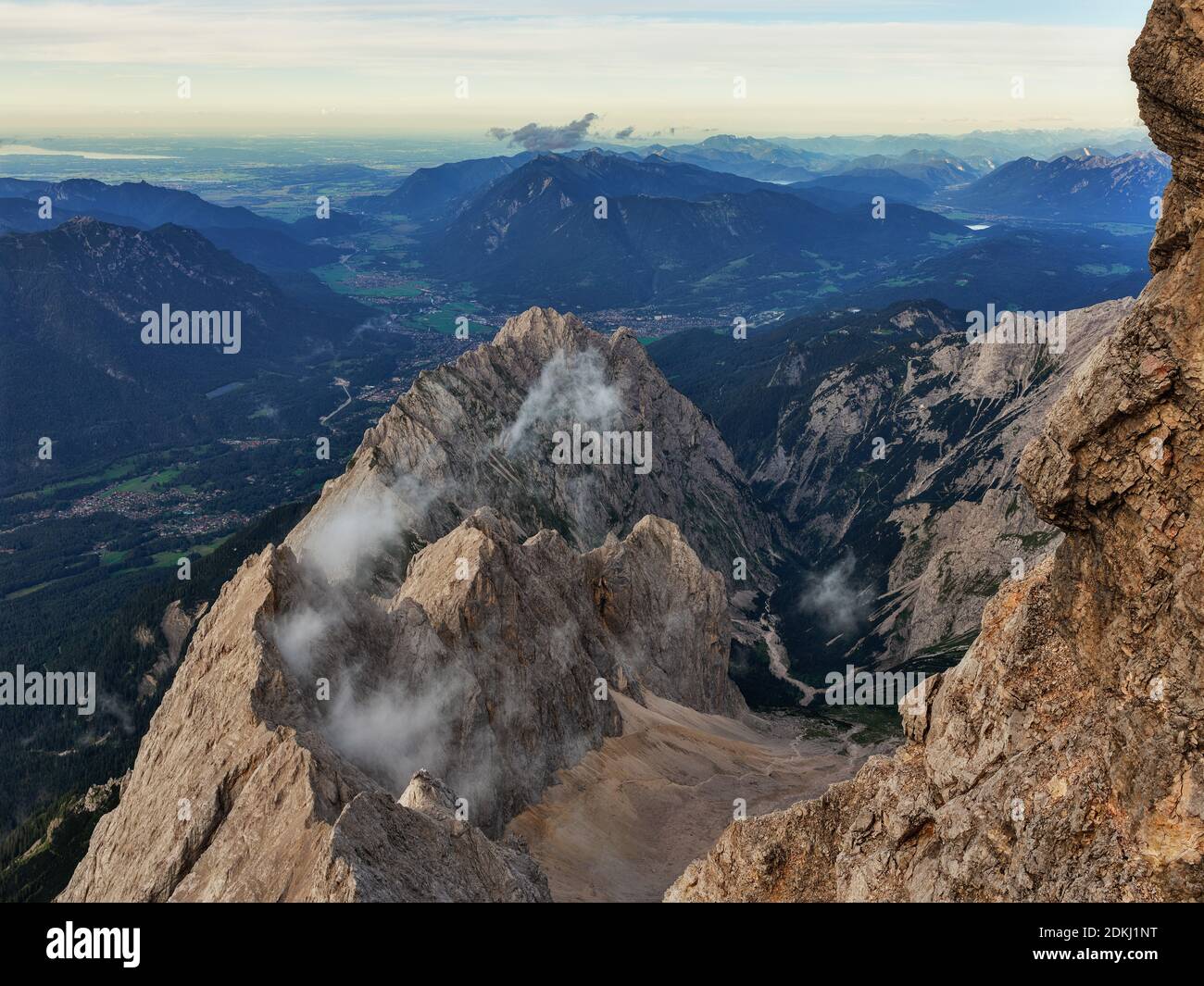 Rocks, ridge, summit, clouds, mountains, alpine, rugged, abyss, vision, via ferrata, alpine hiking trail, Jubiläumsgrat, summit stick Stock Photo