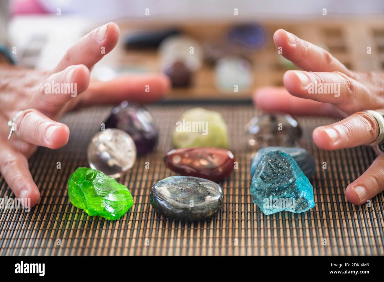 Crystal healing woman chakra stones hi-res stock photography and images ...