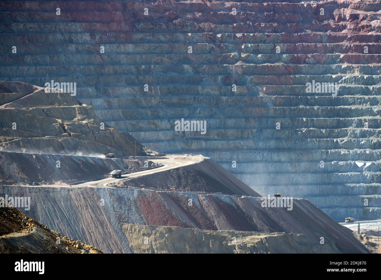 Trucks carrying ore in the Santa Rita or Chino open pit copper mine, near Silver City, New Mexico Stock Photo