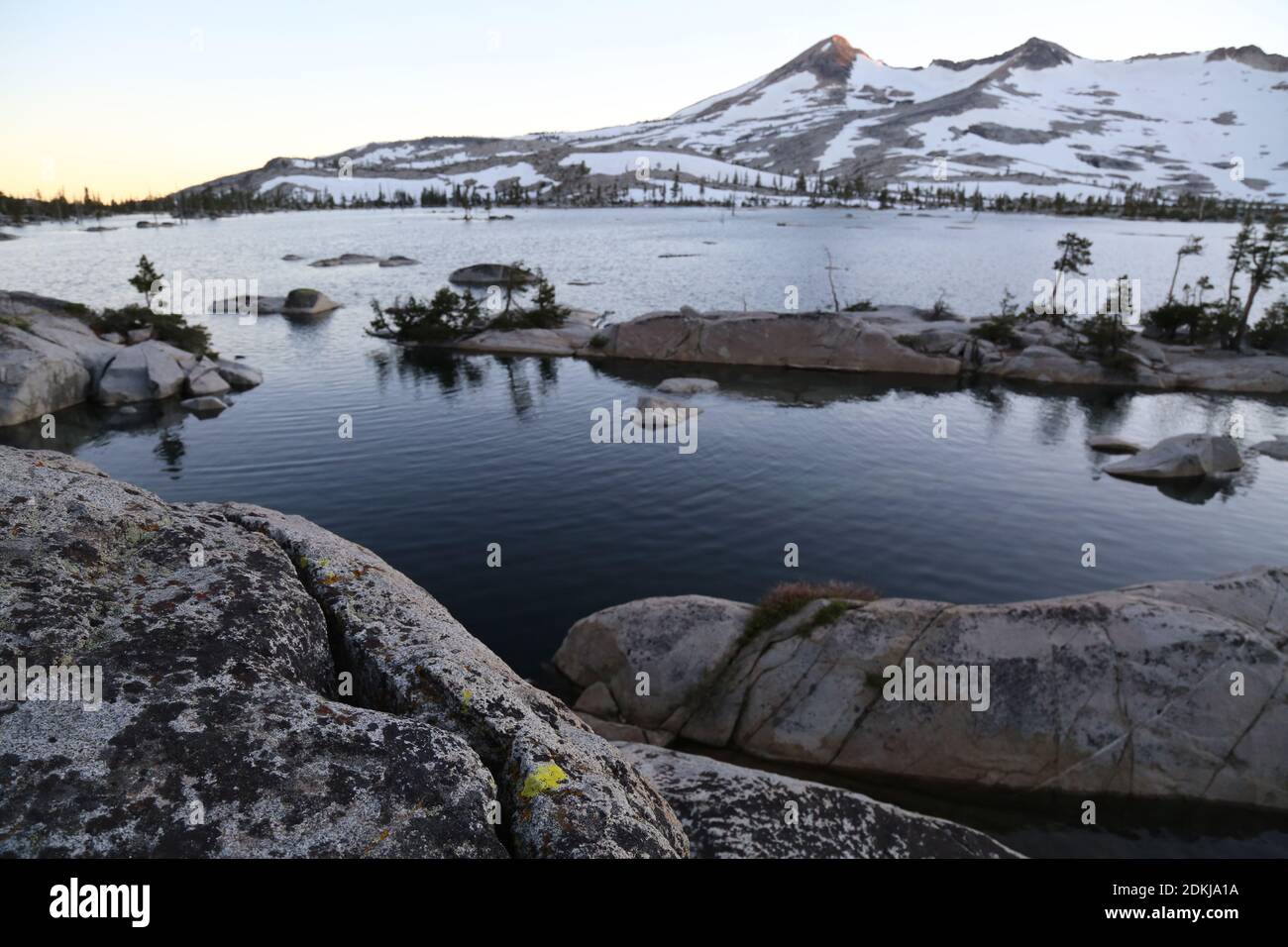 lake aloha with snowy pyramid peak in the background, in Desolation wilderness Stock Photo