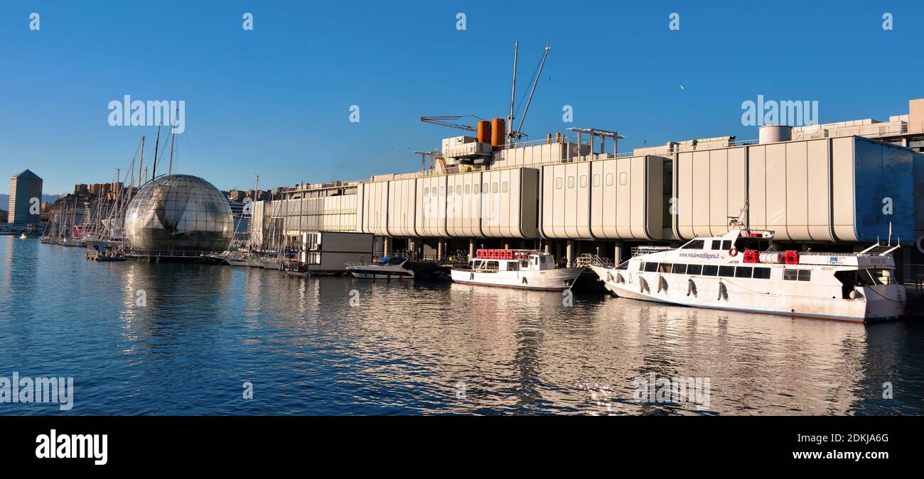 aquarium, bubble (renzo piano biosphere) and panorama of the port and the city skyscrapers December 13 2020 Genoa Italy Stock Photo