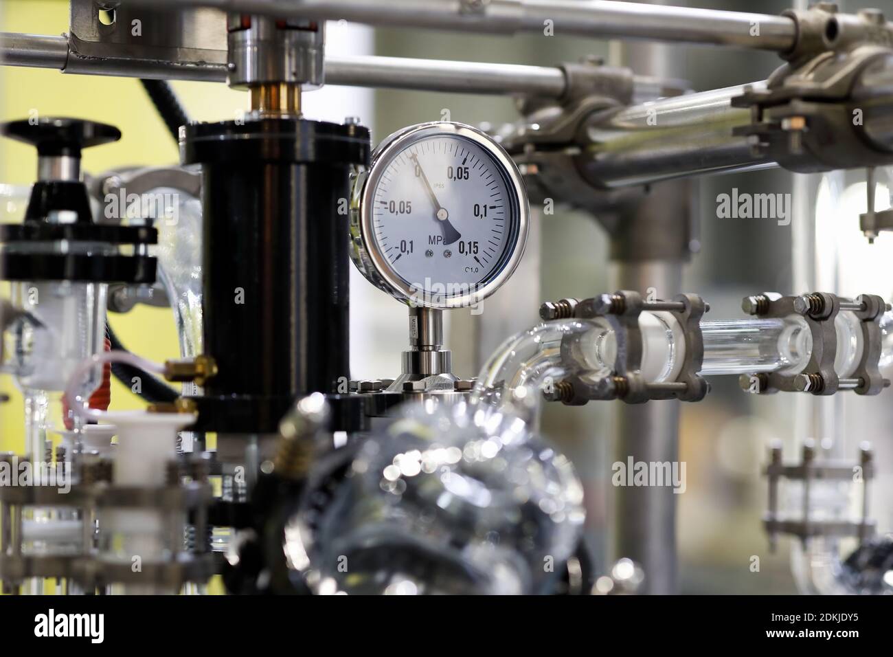 Chemical industrial equipment and pressure gauge meter. Selective focus. Stock Photo