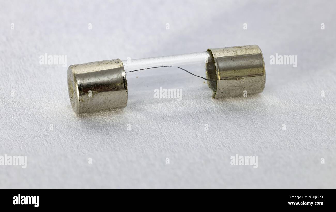 Small electronic fuse (safety device) blown Stock Photo Alamy