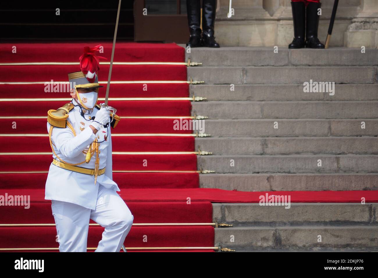 Officer of the Peruvian army, saluting with the sword at the ceremony of awarding the Sword of Honour to the officers, recently graduated, who occupied the first position of their class in the training schools of the Armed Forces. Stock Photo
