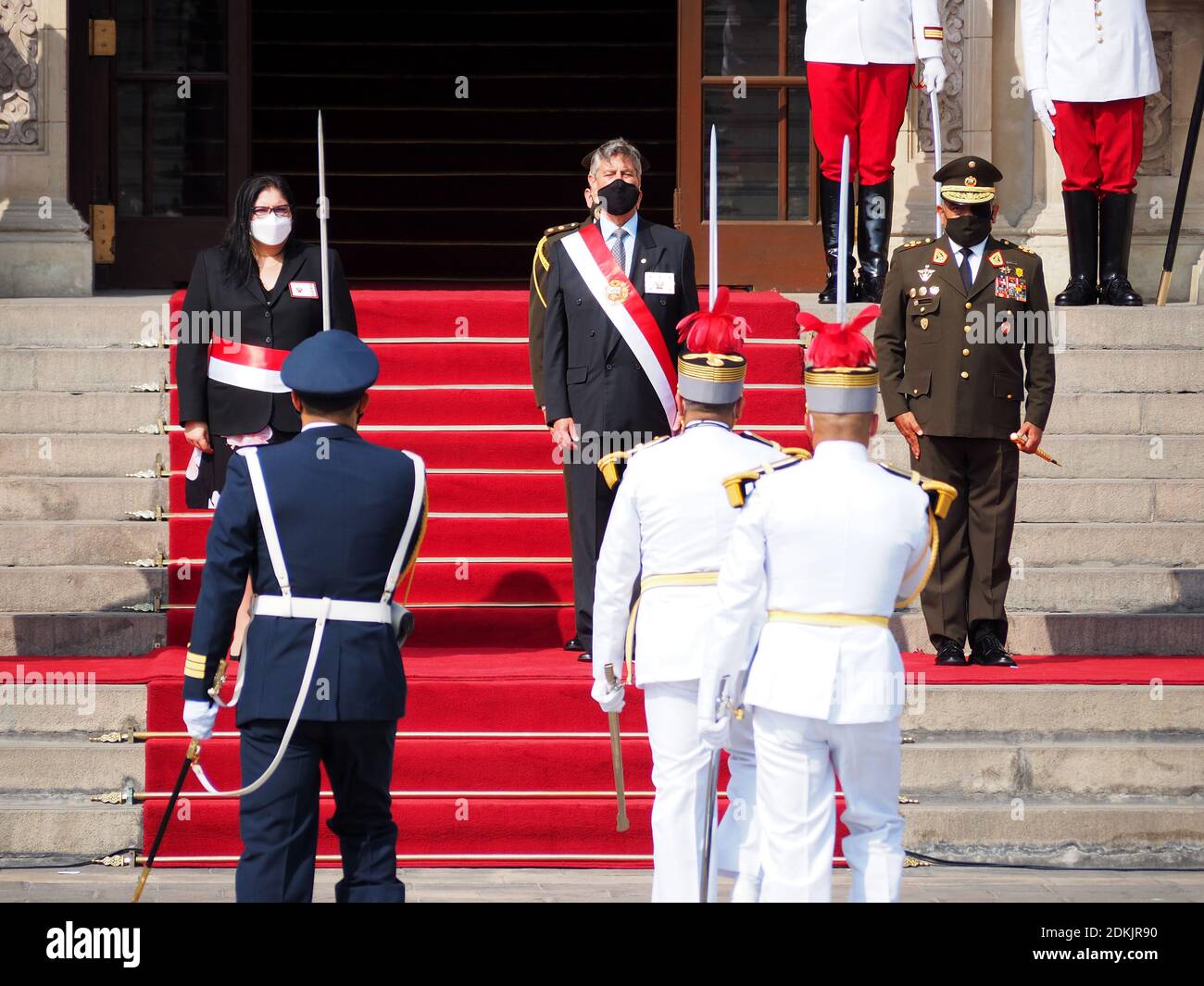 From left to right: Nuria Esparch, Minister of Defense, Francisco Sagasti, President of Peru; General César Astudillo, Chief of the Joint Command of the Armed Forces. The President,  leads the ceremony of awarding the Sword of Honour to the officers, recently graduated, who occupied the first position of their class in the training schools of the Armed Forces. Stock Photo