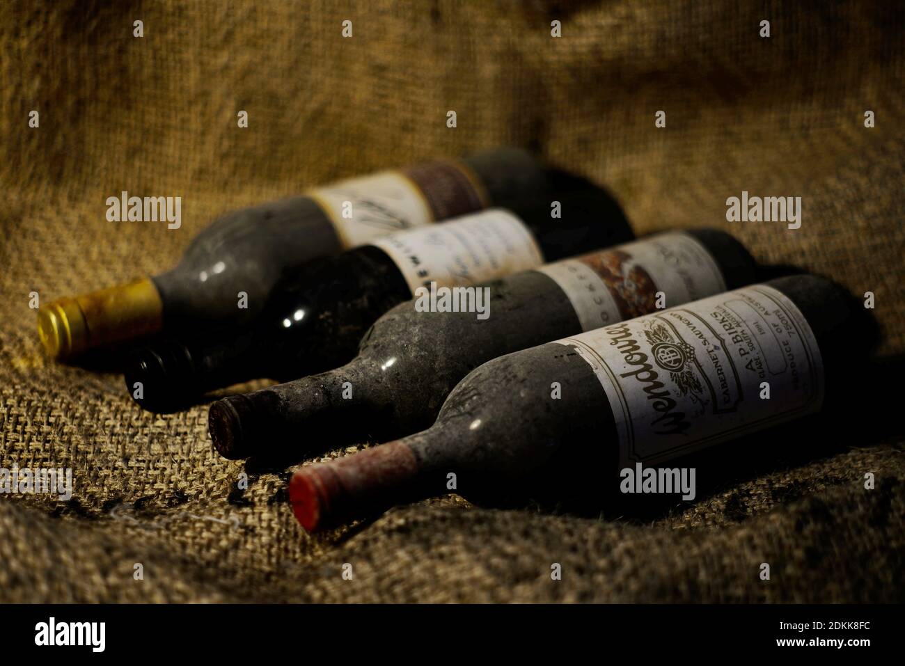 https://c8.alamy.com/comp/2DKK8FC/dusty-old-vintage-wine-bottles-from-south-australia-2DKK8FC.jpg