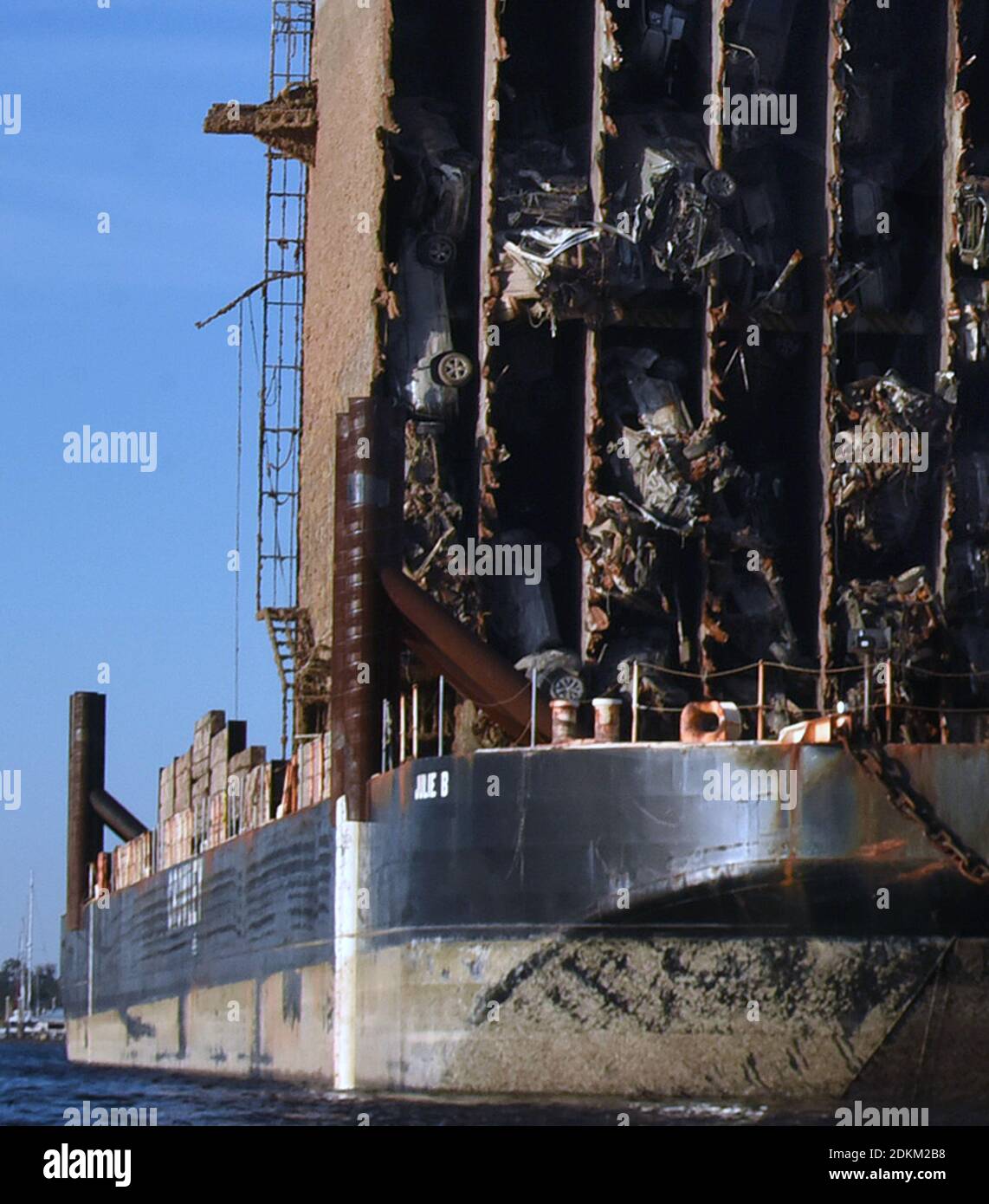 Georgia, USA. 14th Dec, 2020. December 14, 2020 - Brunswick, Georgia, United States - Cars are seen in the bow section of the Golden Ray cargo ship as it sits on a barge on December 14, 2020 in Brunswick, Georgia. A salvage company is cutting the vessel into eight segments, each of which will be removed by a barge and scrapped. The vehicle carrier, loaded with 4200 new cars, capsized in St. Simons Island Sound on September 8, 2019 as it was leaving the Port of Brunswick, Georgia. (Paul Hennessy/Alamy) Credit: Paul Hennessy/Alamy Live News Stock Photo