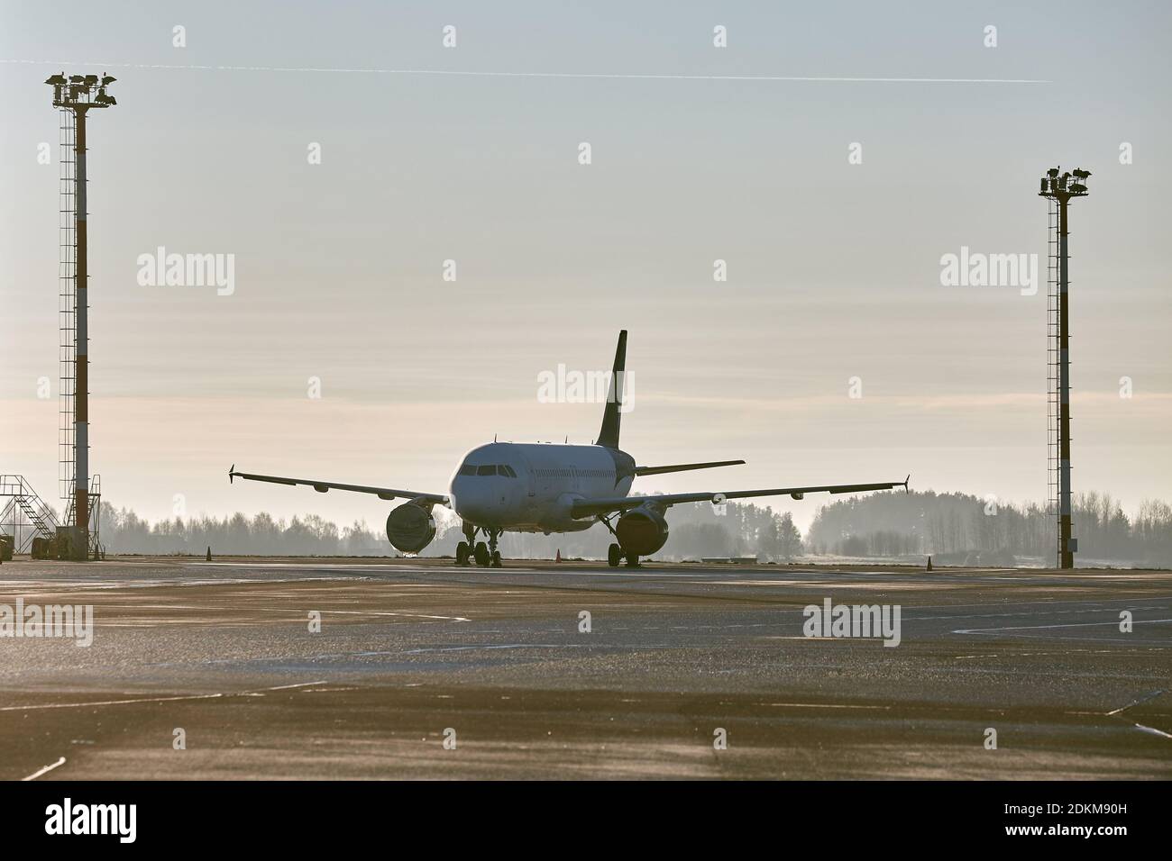Plane parked at an airport Stock Photo - Alamy