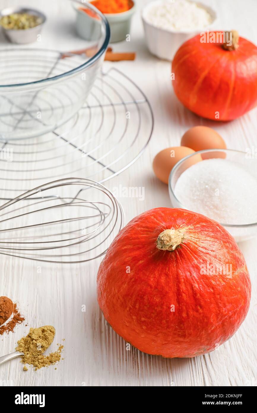 Ingredients for preparing pumpkin pie on table Stock Photo