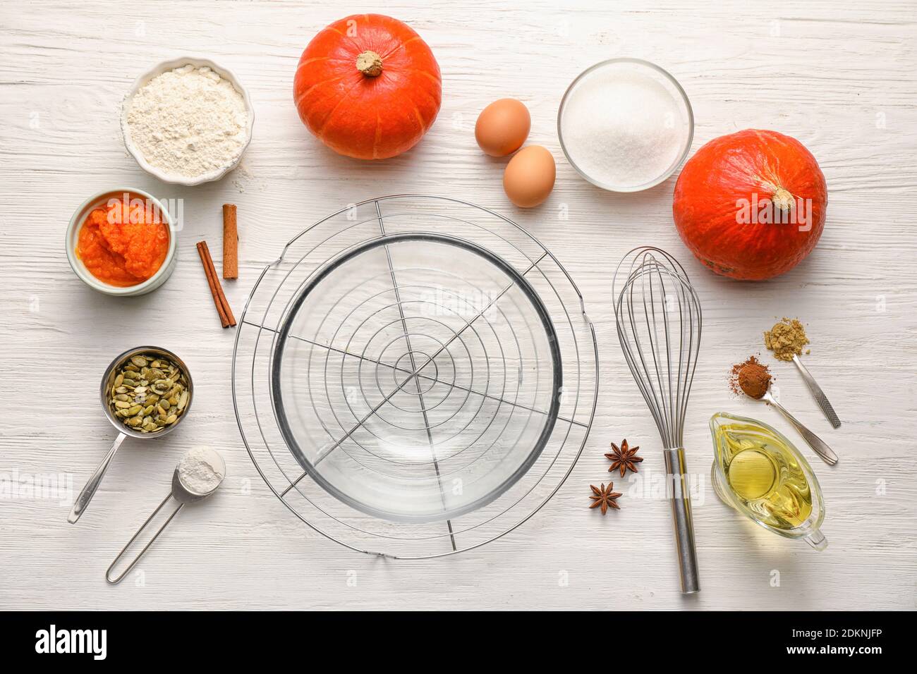 Ingredients for preparing pumpkin pie on table Stock Photo