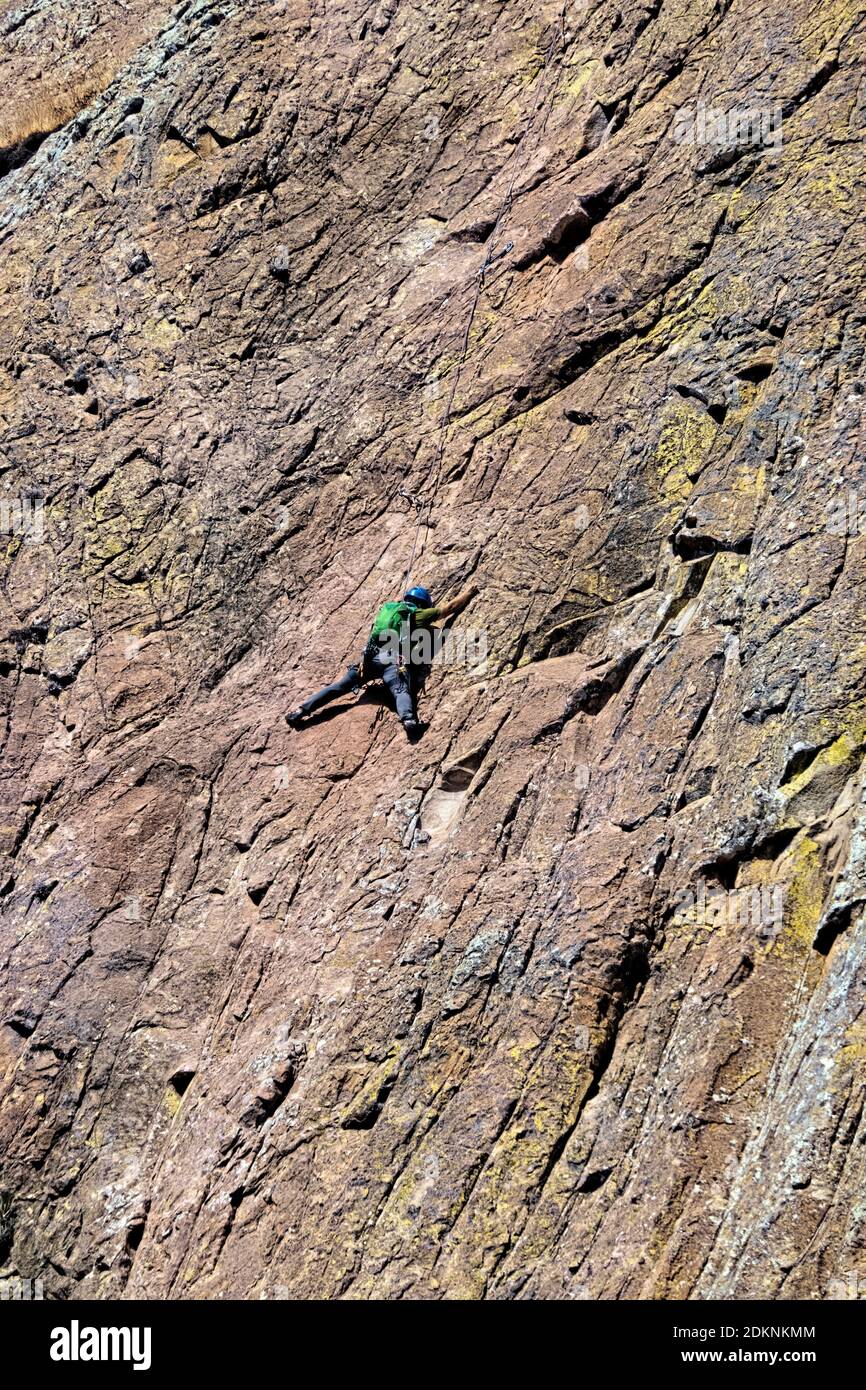 Rock climber on Peña de Bernal, UNESCO site and one of the world’s largest monoliths, Queretaro, Mexico Stock Photo