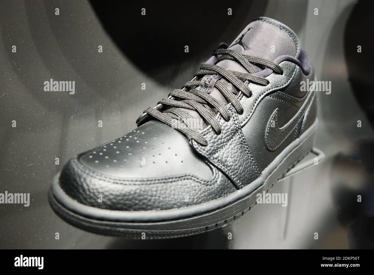 Black Nike Air Jordan 1 low sneakers at retail store display. Mersin,  Turkey - November 2020 Stock Photo - Alamy