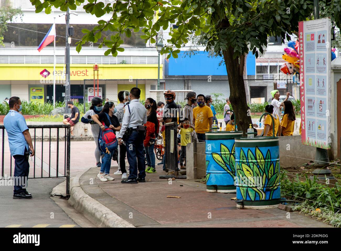 Dec 13, 2020 People checking their body temperature to enter Rizal Park