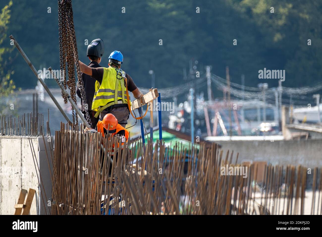 Unrecognizable builders working in port Stock Photo