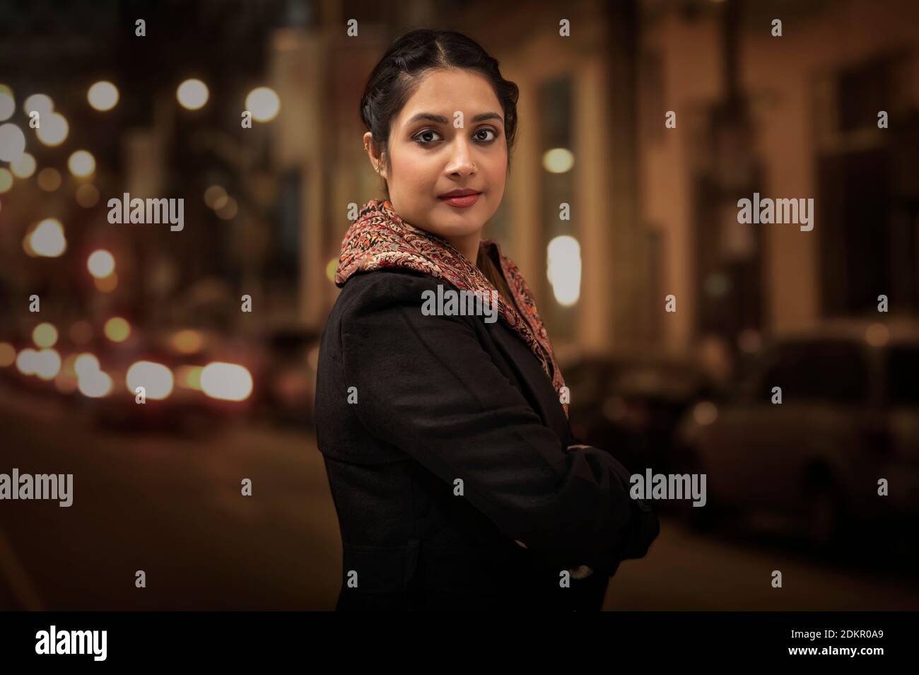 Woman standing cold on street hi-res stock photography and images - Alamy