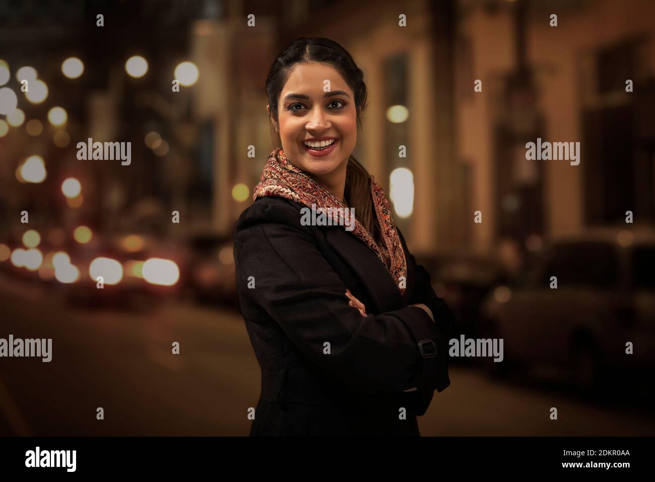 Woman standing cold on street hi-res stock photography and images - Alamy