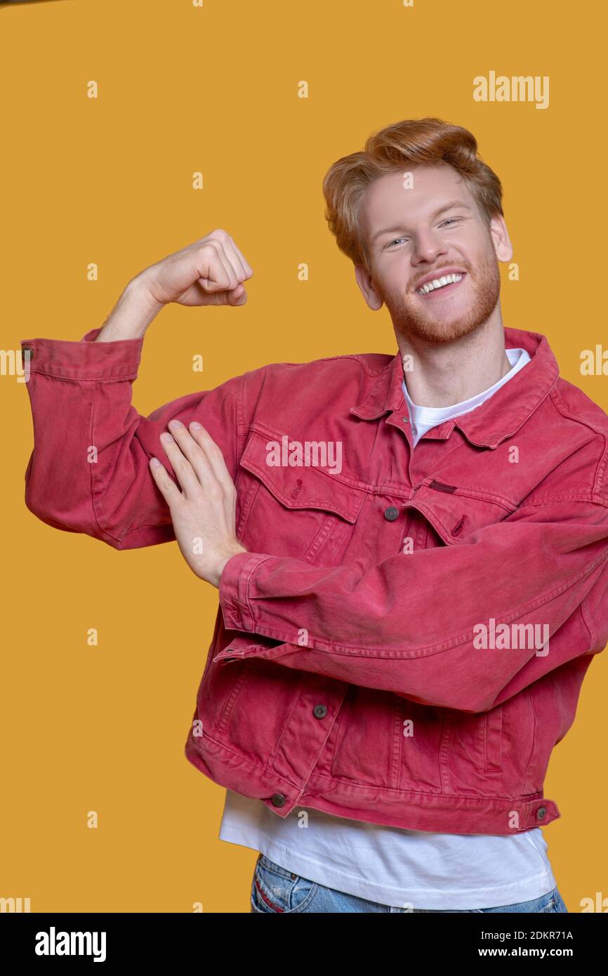 Man in red jacket hires stock photography and images Alamy